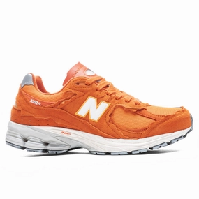 2002R - Vintage Orange New Balance shoes for walking and running