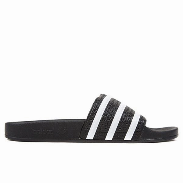 Adilette Slides - Core Black Classic Adidas sneakers with timeless style