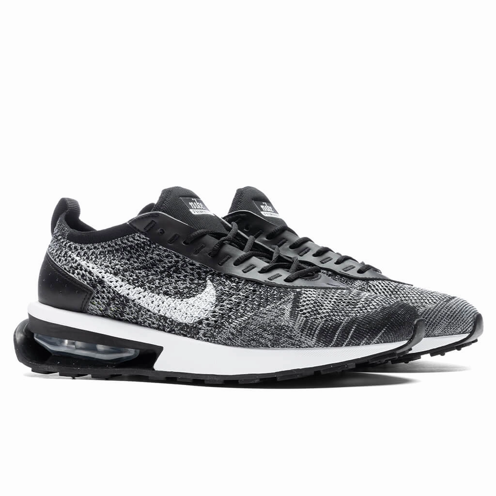 Air Max Flyknit Racer - Black/White Nike trainers with responsive foam