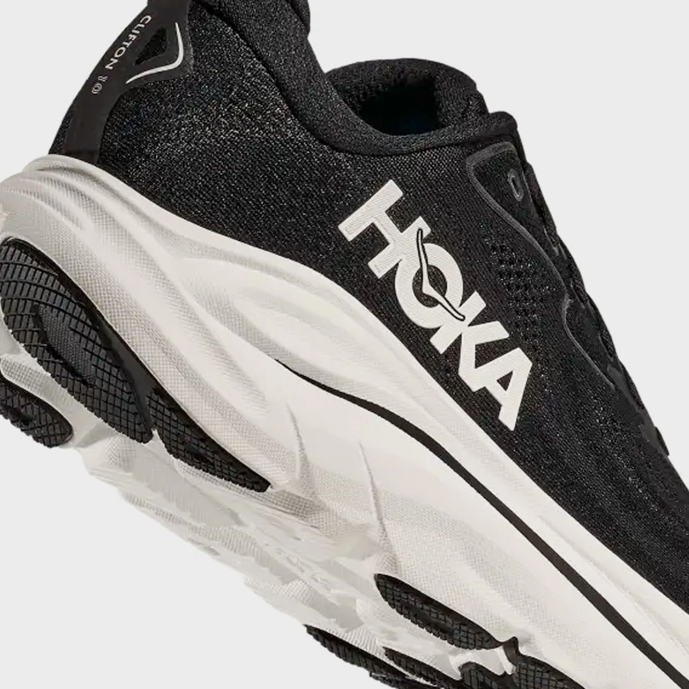 Clifton 10 Mens Running Shoes (Black/White) Trail grip footwear