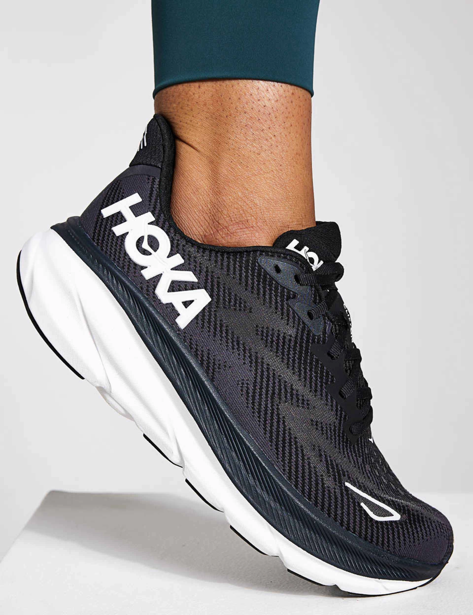 Clifton 9 - Black/White Hoka trail-ready performance shoes