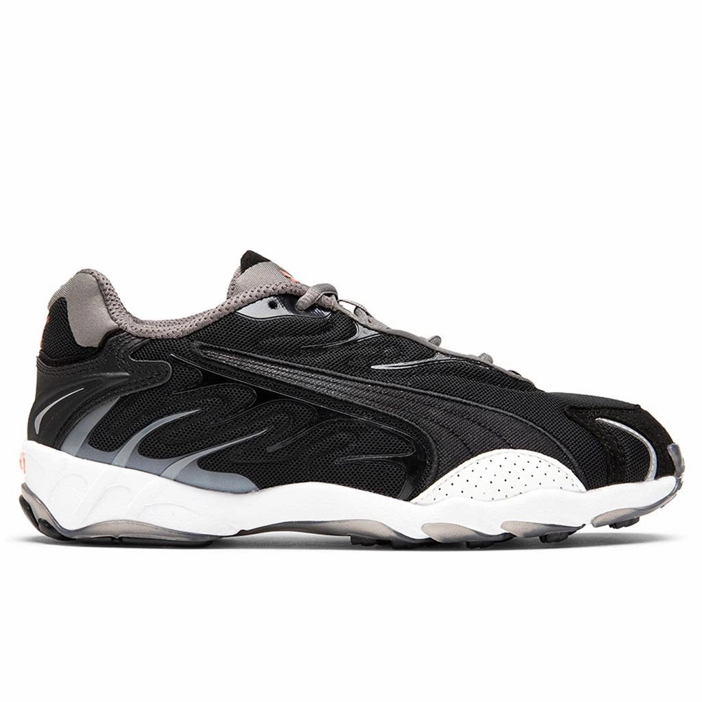 Inhale Flares - Black/White Puma trainers with bold stripe logo