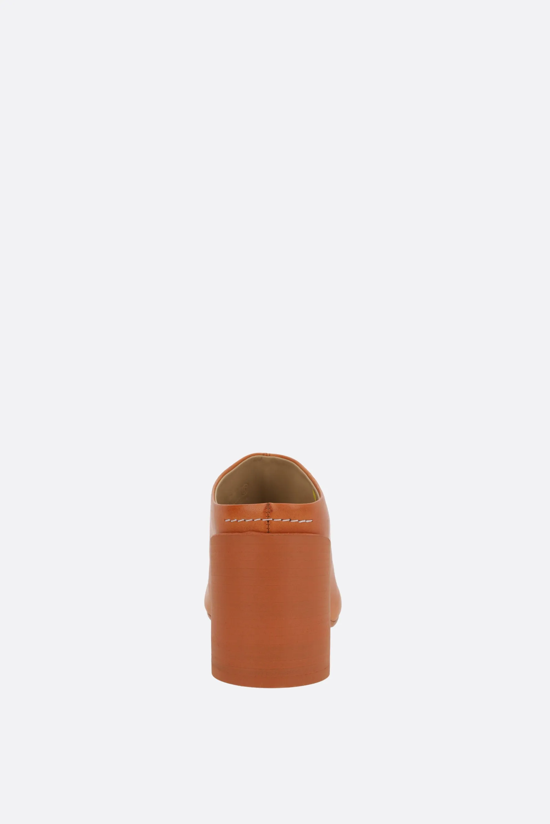 mule in stitch-out leather