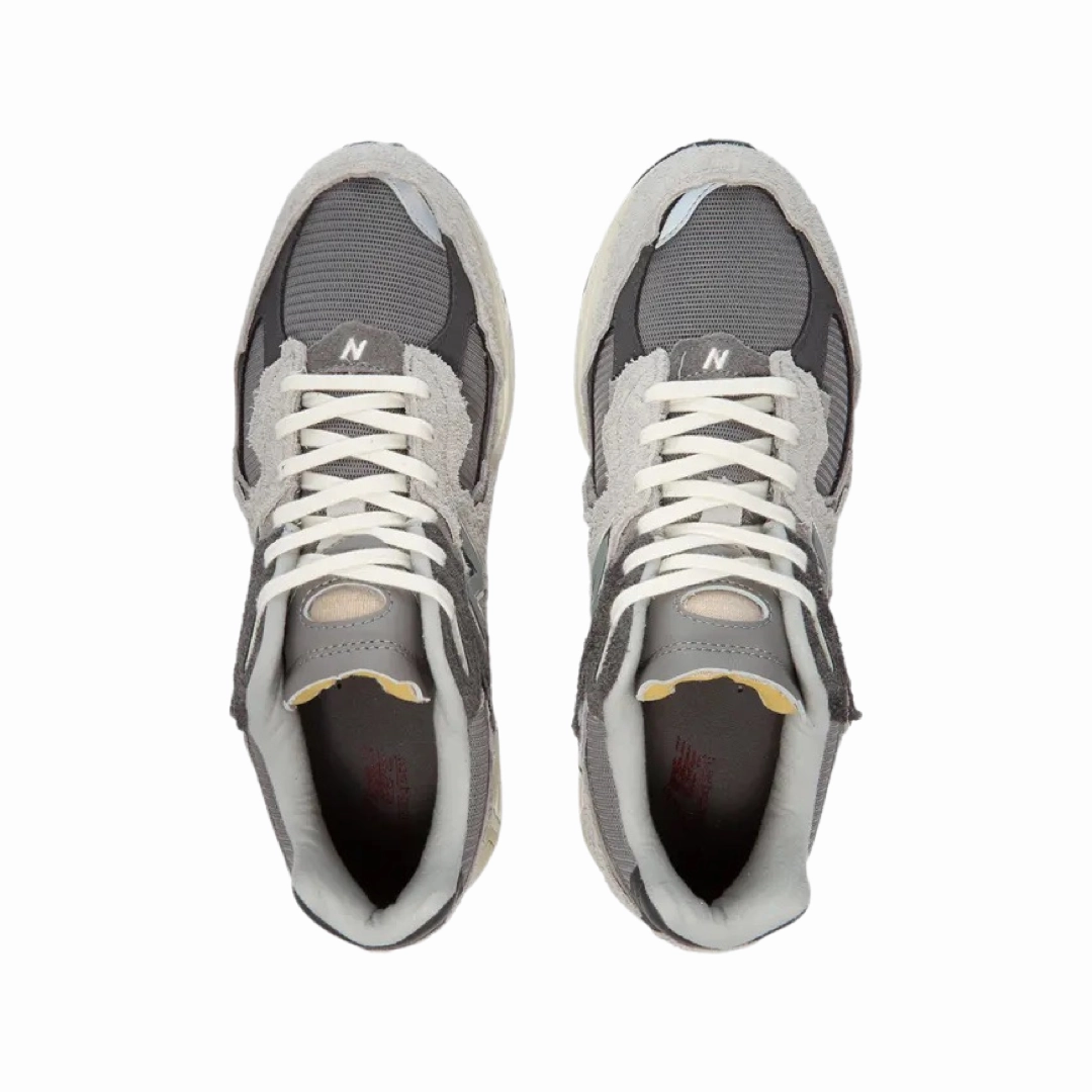 New Balance 2002R Protection Pack Rain Cloud Grey White Iconic Court Sneakers