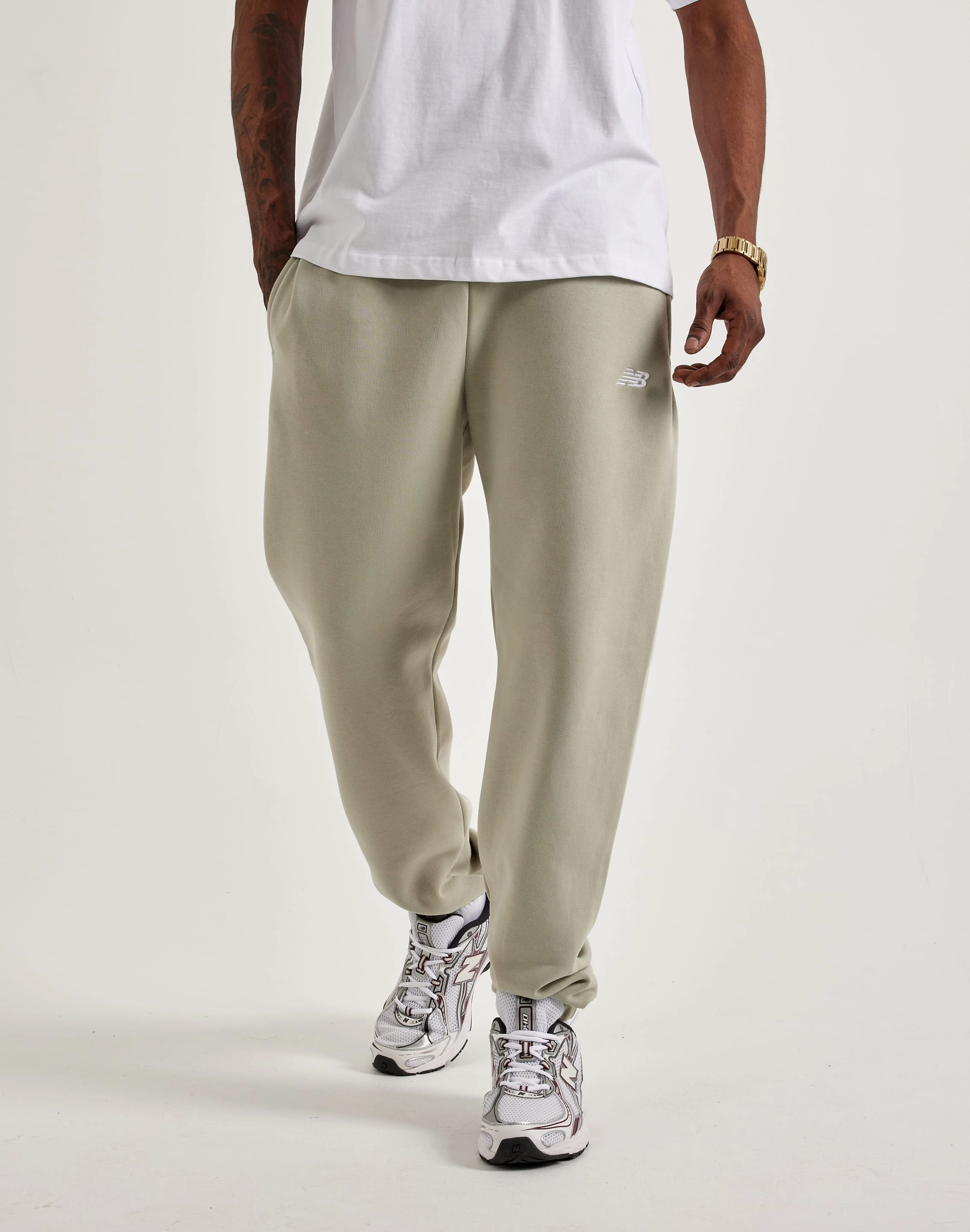 New Balance Sport Essentials French Terry Joggers New Balance sneakers with cushioned midsoles