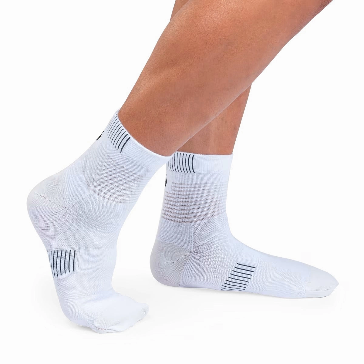 ON Performance Ultralight Mid Sock White Black On running shoe close-ups