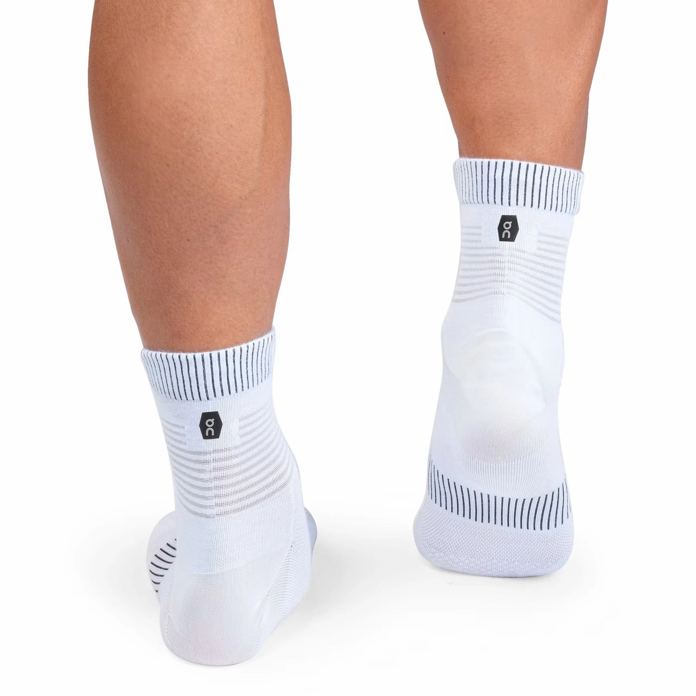 ON Performance Ultralight Mid Sock White Black On running shoe close-ups