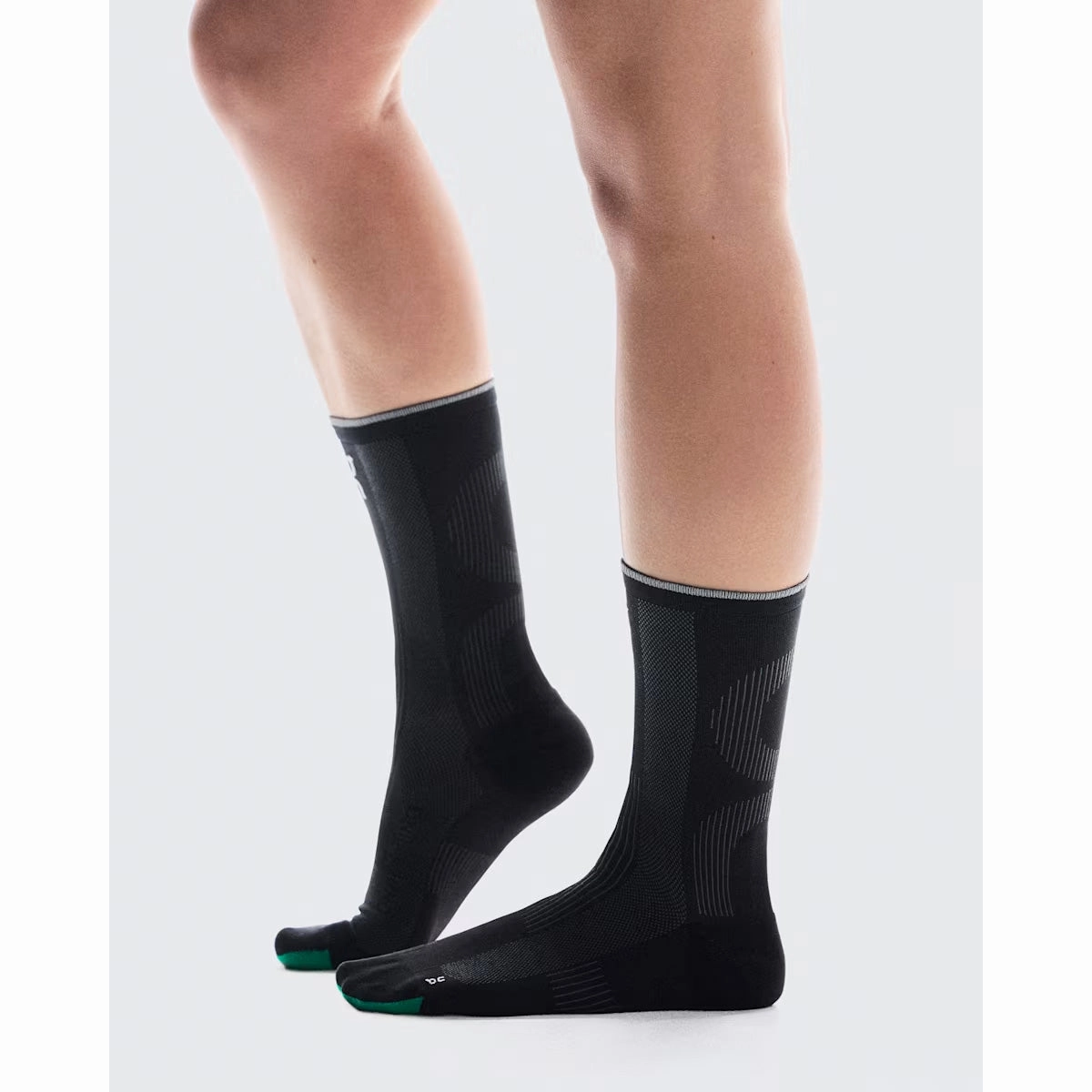 ON Unisex Elite Run Sock High Black Magnet On running shoe close-ups