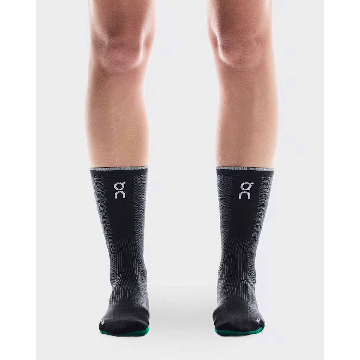 ON Unisex Elite Run Sock High Black Magnet On running shoe close-ups