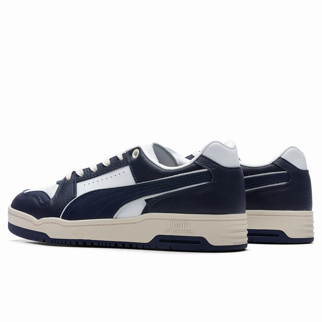 Slipstream Lo Vintage - White/New Navy Puma Suede Street Sneakers