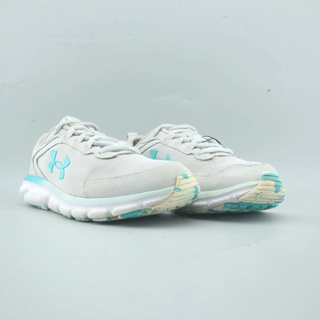 UNDER ARMOUR CHARGED ASSERT 9 Under Armour sport shoe shots