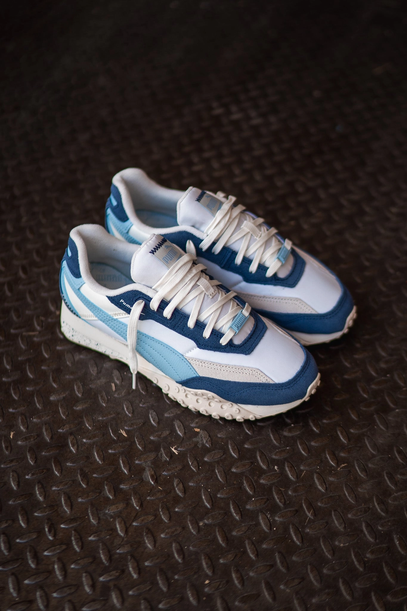 Women Puma Blacktop Rider (Warm White/Inky Blue) Puma athletic shoe visuals