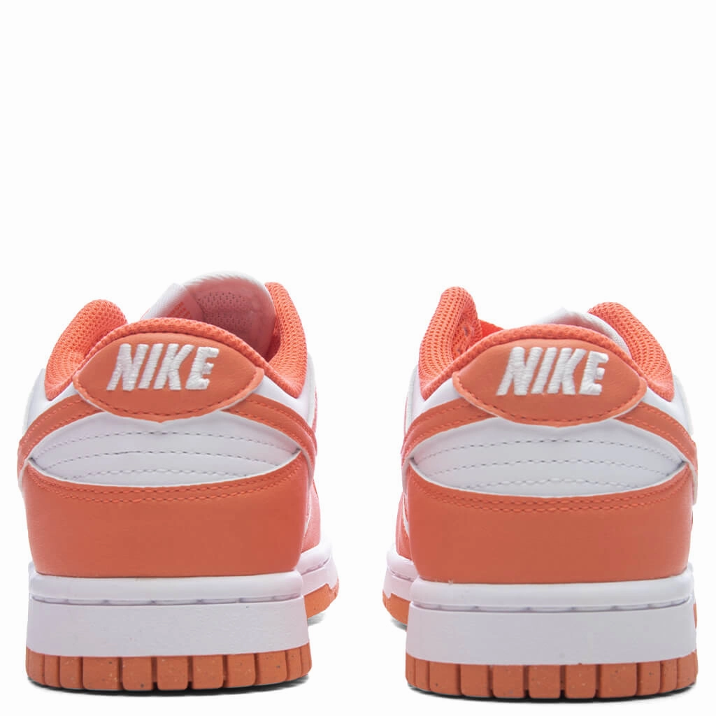 Women's Dunk Low - White/Light Wild Mango Nike Bold Logo Sneakers