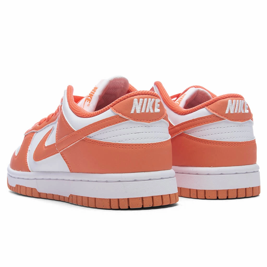 Women's Dunk Low - White/Light Wild Mango Nike Bold Logo Sneakers
