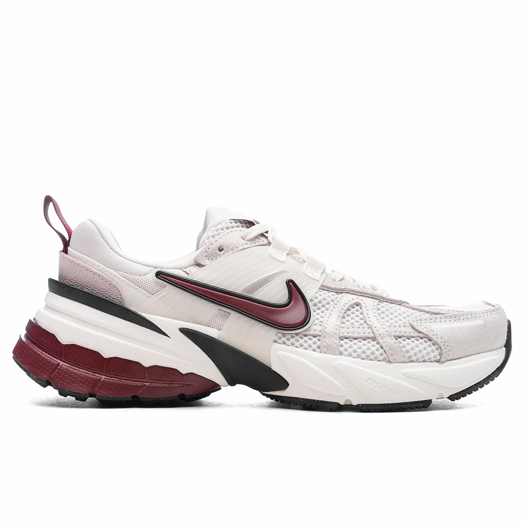 Women's V2K Run SE - White/Team Red/Black Nike fashion sneakers with bold branding